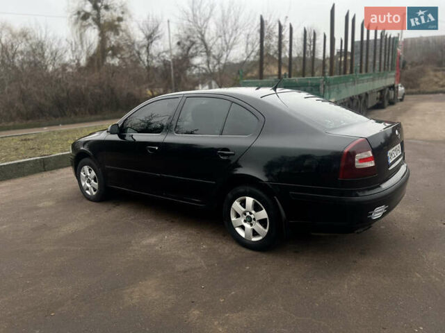 Черный Шкода Октавия, объемом двигателя 2 л и пробегом 240 тыс. км за 5600 $, фото 4 на Automoto.ua