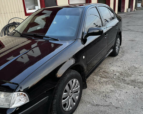 Черный Шкода Октавия, объемом двигателя 1.6 л и пробегом 250 тыс. км за 5200 $, фото 19 на Automoto.ua