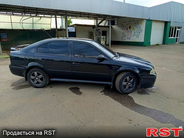 Черный Шкода Октавия, объемом двигателя 1.8 л и пробегом 185 тыс. км за 5200 $, фото 1 на Automoto.ua