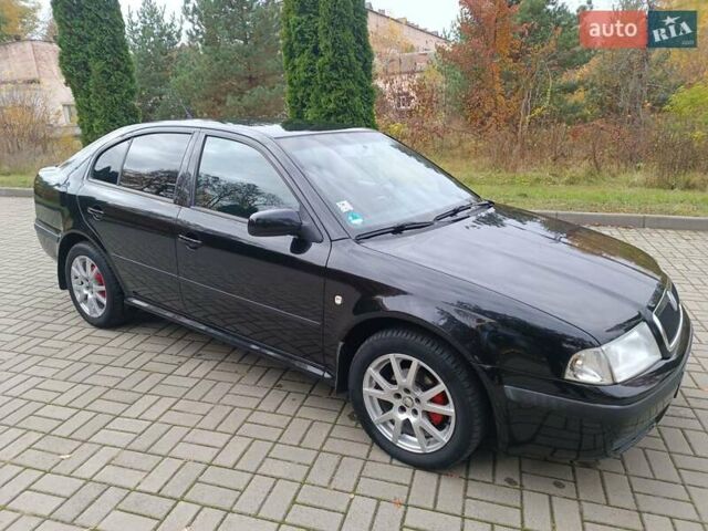 Черный Шкода Октавия, объемом двигателя 1.6 л и пробегом 300 тыс. км за 4600 $, фото 3 на Automoto.ua