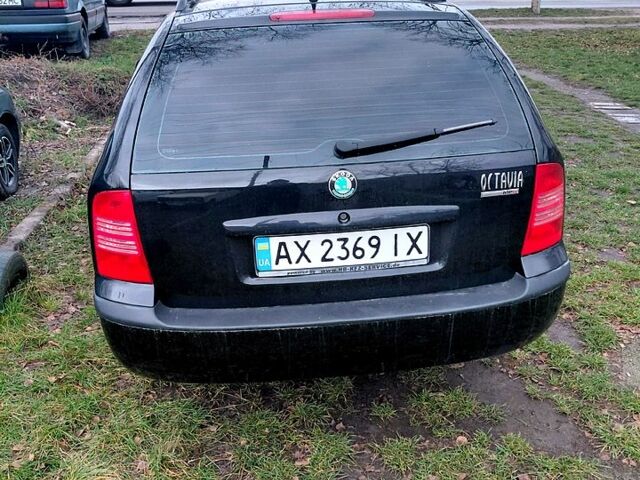 Черный Шкода Октавия, объемом двигателя 1.6 л и пробегом 187 тыс. км за 5700 $, фото 3 на Automoto.ua