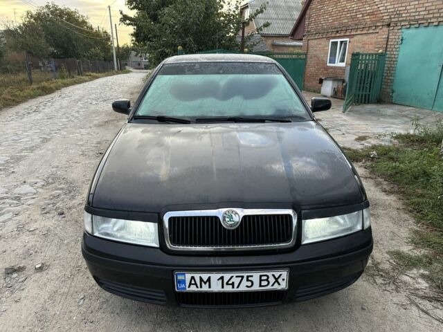 Черный Шкода Октавия, объемом двигателя 1.6 л и пробегом 210 тыс. км за 5200 $, фото 1 на Automoto.ua