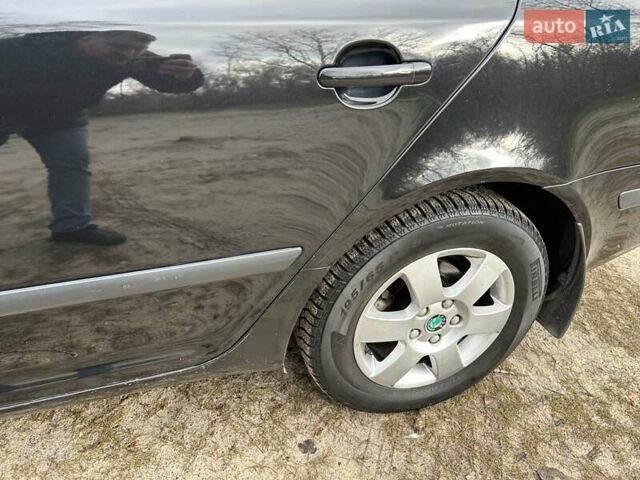 Черный Шкода Октавия, объемом двигателя 1.6 л и пробегом 253 тыс. км за 5800 $, фото 12 на Automoto.ua