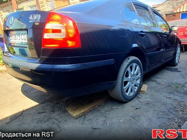 Черный Шкода Октавия, объемом двигателя 2 л и пробегом 262 тыс. км за 7000 $, фото 2 на Automoto.ua