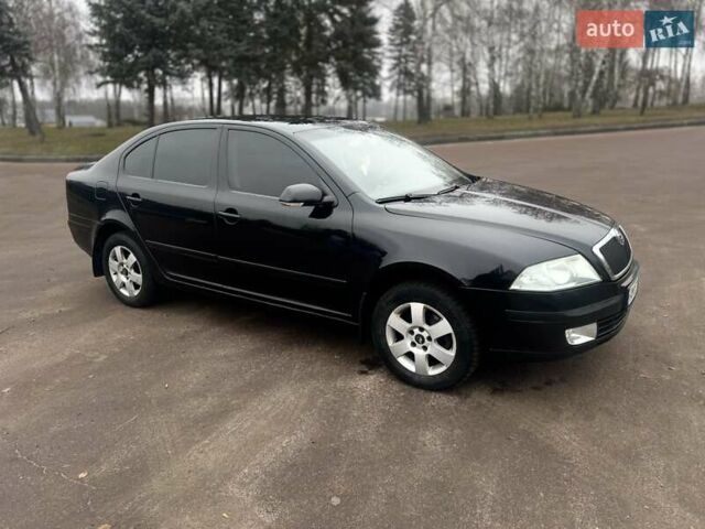 Черный Шкода Октавия, объемом двигателя 2 л и пробегом 240 тыс. км за 5600 $, фото 2 на Automoto.ua