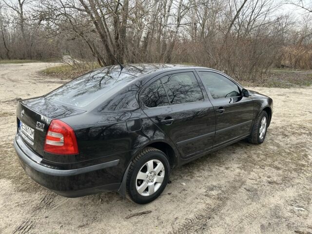 Черный Шкода Октавия, объемом двигателя 1.6 л и пробегом 253 тыс. км за 5800 $, фото 4 на Automoto.ua