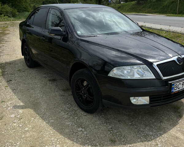 Черный Шкода Октавия, объемом двигателя 1.6 л и пробегом 200 тыс. км за 5200 $, фото 5 на Automoto.ua