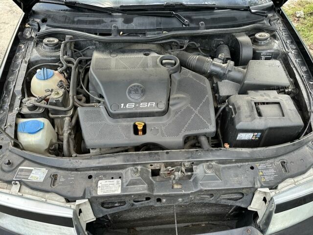 Черный Шкода Октавия, объемом двигателя 1.6 л и пробегом 210 тыс. км за 5200 $, фото 2 на Automoto.ua