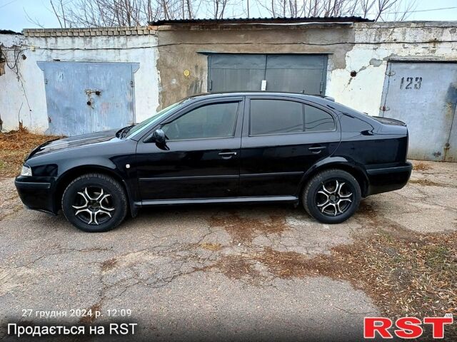 Шкода Октавия 2007 в Николаеве на Automoto.ua Черный Шкода Октавия, объемом двигателя 1.6 л и пробегом 240 тыс. км за 5333 $, фото 13 на Automoto.ua