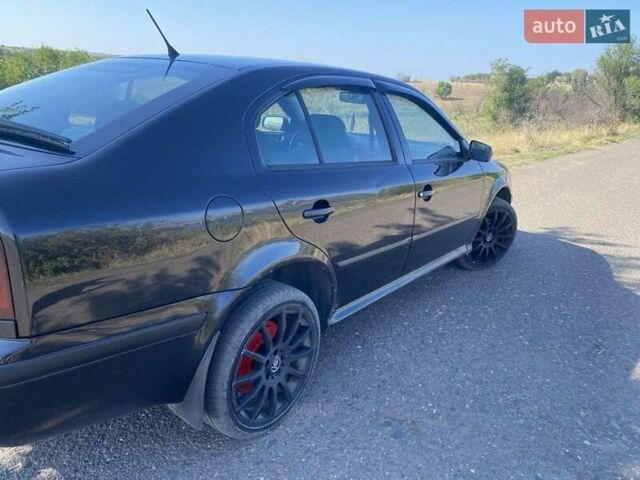 Черный Шкода Октавия, объемом двигателя 1.6 л и пробегом 282 тыс. км за 5000 $, фото 3 на Automoto.ua