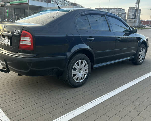 Черный Шкода Октавия, объемом двигателя 1.6 л и пробегом 263 тыс. км за 5600 $, фото 2 на Automoto.ua