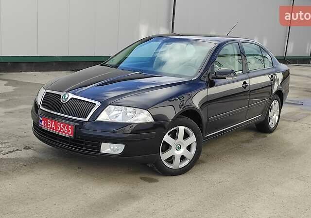 Черный Шкода Октавия, объемом двигателя 1.6 л и пробегом 218 тыс. км за 6999 $, фото 2 на Automoto.ua