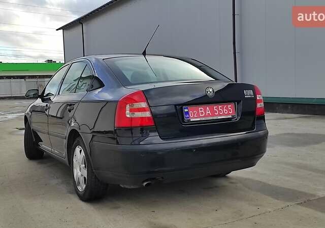 Черный Шкода Октавия, объемом двигателя 1.6 л и пробегом 218 тыс. км за 6999 $, фото 84 на Automoto.ua