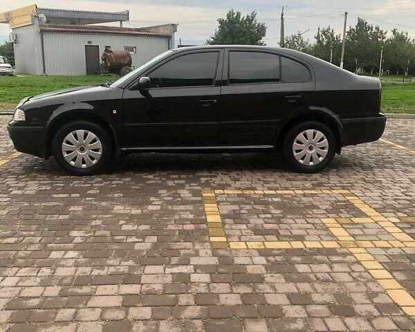 Черный Шкода Октавия, объемом двигателя 1.6 л и пробегом 273 тыс. км за 4300 $, фото 4 на Automoto.ua
