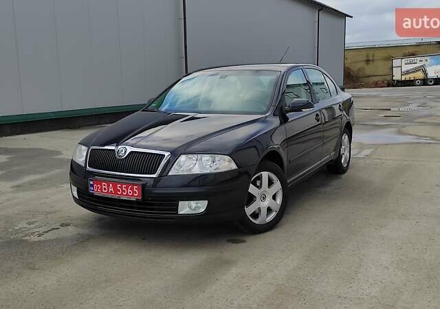Черный Шкода Октавия, объемом двигателя 1.6 л и пробегом 218 тыс. км за 6999 $, фото 89 на Automoto.ua