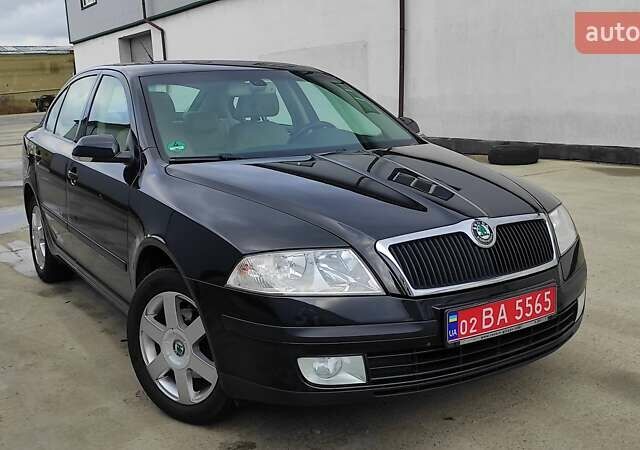 Черный Шкода Октавия, объемом двигателя 1.6 л и пробегом 218 тыс. км за 6999 $, фото 92 на Automoto.ua