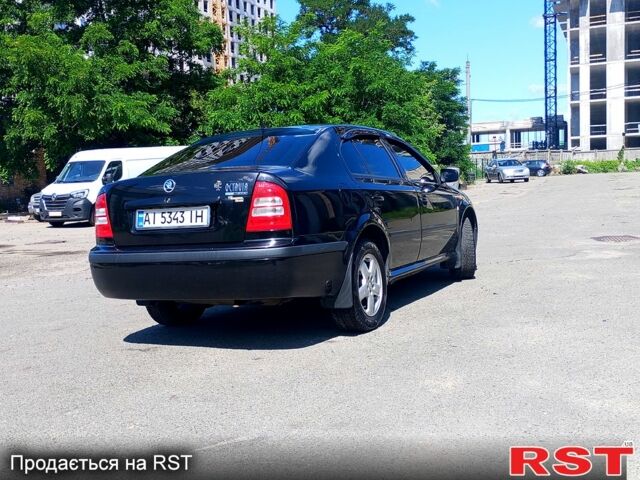 Чорний Шкода Октавія, об'ємом двигуна 1.8 л та пробігом 345 тис. км за 5700 $, фото 2 на Automoto.ua