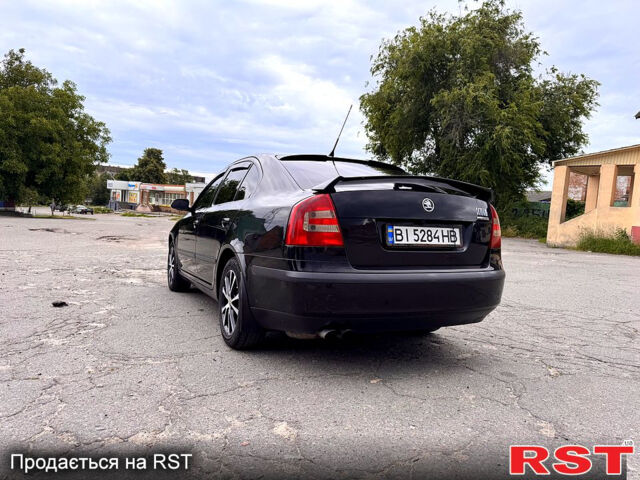 Чорний Шкода Октавія, об'ємом двигуна 2 л та пробігом 300 тис. км за 5800 $, фото 4 на Automoto.ua