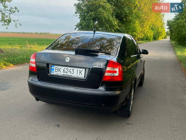 Черный Шкода Октавия, объемом двигателя 1.6 л и пробегом 273 тыс. км за 5650 $, фото 9 на Automoto.ua