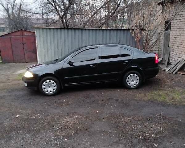 Черный Шкода Октавия, объемом двигателя 1.6 л и пробегом 210 тыс. км за 6300 $, фото 2 на Automoto.ua