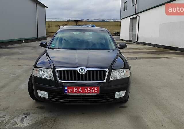Черный Шкода Октавия, объемом двигателя 1.6 л и пробегом 218 тыс. км за 6999 $, фото 4 на Automoto.ua