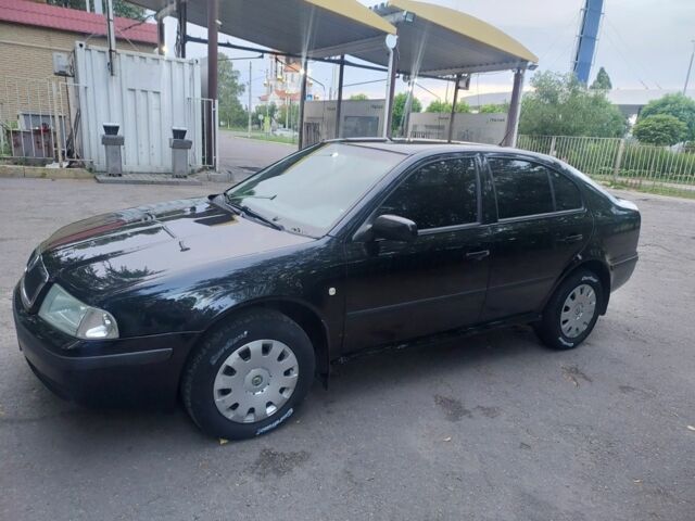 Черный Шкода Октавия, объемом двигателя 1.6 л и пробегом 177 тыс. км за 5800 $, фото 6 на Automoto.ua