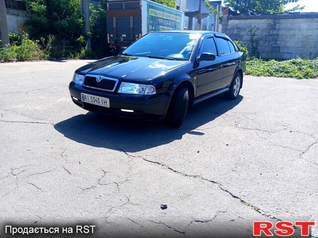 Чорний Шкода Октавія, об'ємом двигуна 1.8 л та пробігом 345 тис. км за 5700 $, фото 9 на Automoto.ua