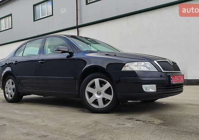 Черный Шкода Октавия, объемом двигателя 1.6 л и пробегом 218 тыс. км за 6999 $, фото 77 на Automoto.ua