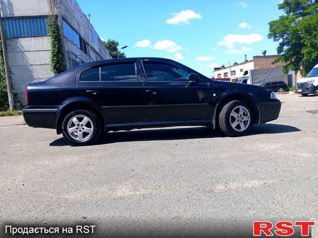 Чорний Шкода Октавія, об'ємом двигуна 1.8 л та пробігом 345 тис. км за 5700 $, фото 3 на Automoto.ua