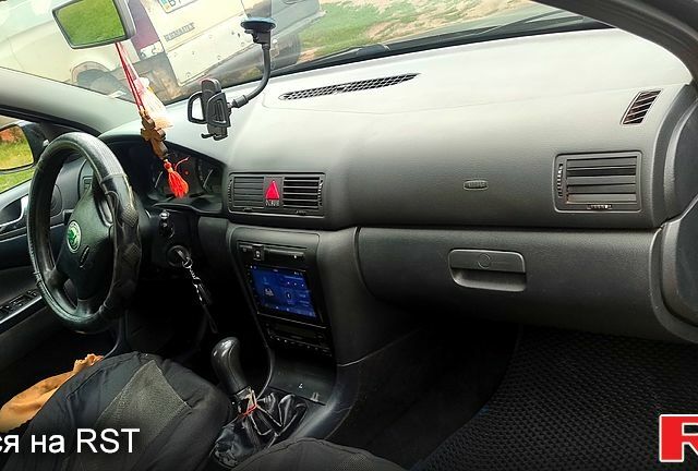 Черный Шкода Октавия, объемом двигателя 2 л и пробегом 300 тыс. км за 4100 $, фото 6 на Automoto.ua