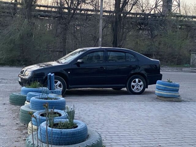 Черный Шкода Октавия, объемом двигателя 1.6 л и пробегом 282 тыс. км за 5000 $, фото 1 на Automoto.ua
