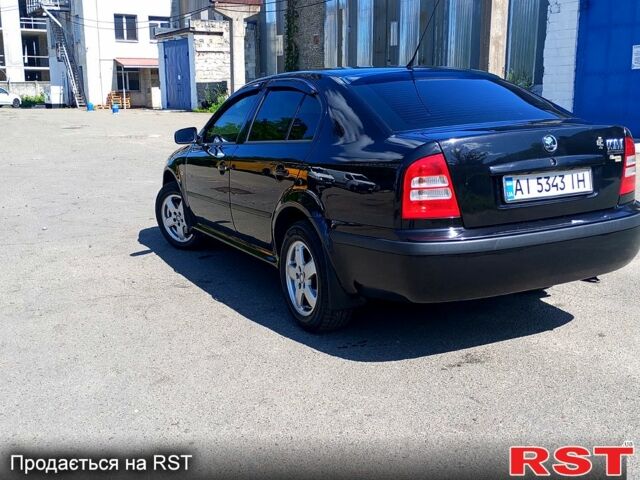 Чорний Шкода Октавія, об'ємом двигуна 1.8 л та пробігом 345 тис. км за 5700 $, фото 1 на Automoto.ua