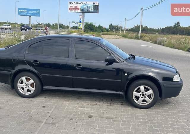 Черный Шкода Октавия, объемом двигателя 1.6 л и пробегом 243 тыс. км за 4700 $, фото 4 на Automoto.ua