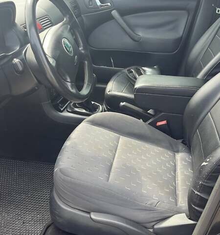 Черный Шкода Октавия, объемом двигателя 1.6 л и пробегом 243 тыс. км за 4700 $, фото 9 на Automoto.ua