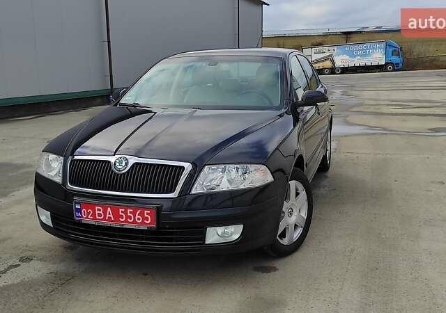 Черный Шкода Октавия, объемом двигателя 1.6 л и пробегом 218 тыс. км за 6999 $, фото 90 на Automoto.ua