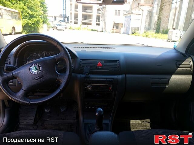 Чорний Шкода Октавія, об'ємом двигуна 1.8 л та пробігом 345 тис. км за 5700 $, фото 6 на Automoto.ua