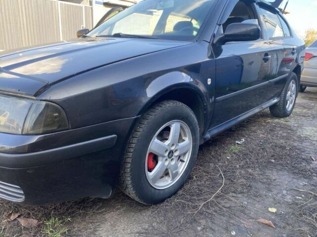 Черный Шкода Октавия, объемом двигателя 1.6 л и пробегом 282 тыс. км за 5000 $, фото 2 на Automoto.ua