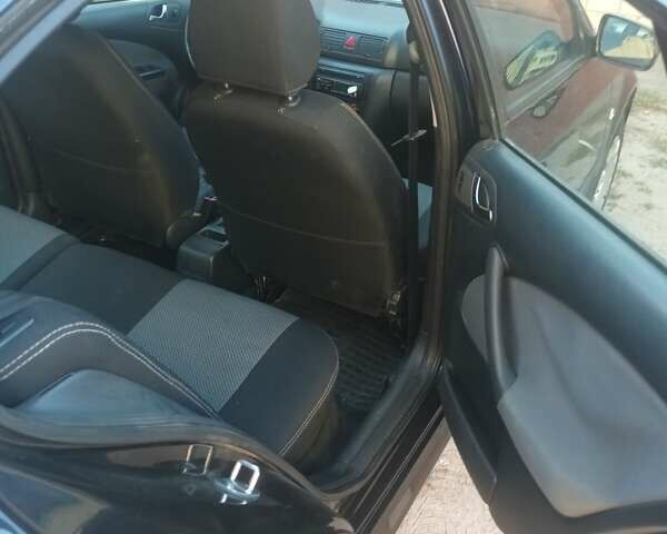 Черный Шкода Октавия, объемом двигателя 1.6 л и пробегом 291 тыс. км за 5500 $, фото 4 на Automoto.ua