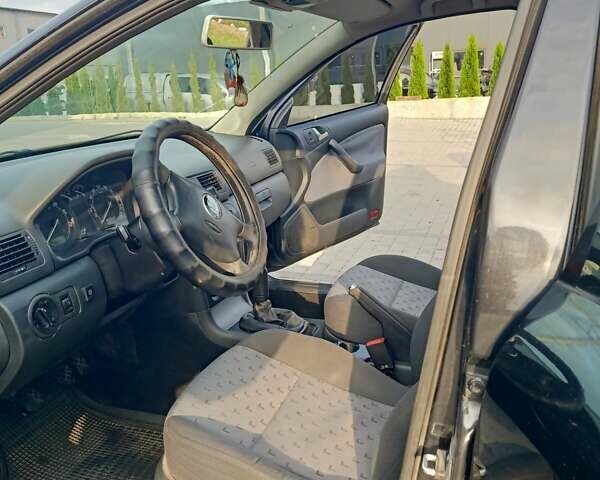 Черный Шкода Октавия, объемом двигателя 1.6 л и пробегом 228 тыс. км за 4800 $, фото 13 на Automoto.ua