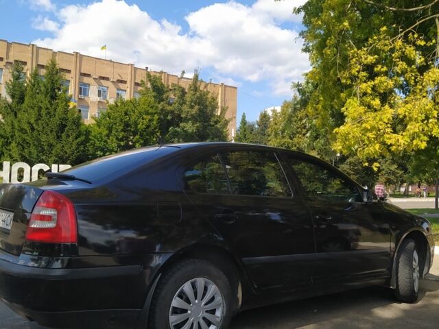 Черный Шкода Октавия, объемом двигателя 1 л и пробегом 275 тыс. км за 5500 $, фото 2 на Automoto.ua