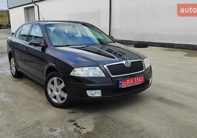 Черный Шкода Октавия, объемом двигателя 1.6 л и пробегом 218 тыс. км за 6999 $, фото 75 на Automoto.ua