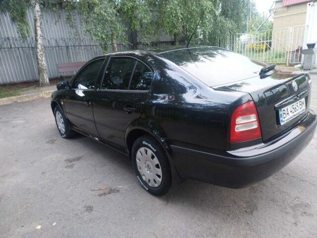 Черный Шкода Октавия, объемом двигателя 1.6 л и пробегом 177 тыс. км за 5800 $, фото 2 на Automoto.ua