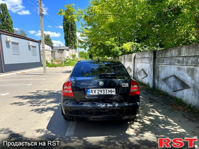 Черный Шкода Октавия, объемом двигателя 1.6 л и пробегом 255 тыс. км за 4000 $, фото 1 на Automoto.ua