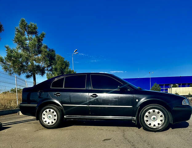 Черный Шкода Октавия, объемом двигателя 1.9 л и пробегом 300 тыс. км за 8200 $, фото 2 на Automoto.ua