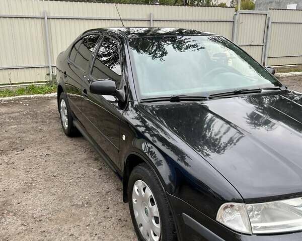 Черный Шкода Октавия, объемом двигателя 1.6 л и пробегом 221 тыс. км за 7300 $, фото 15 на Automoto.ua