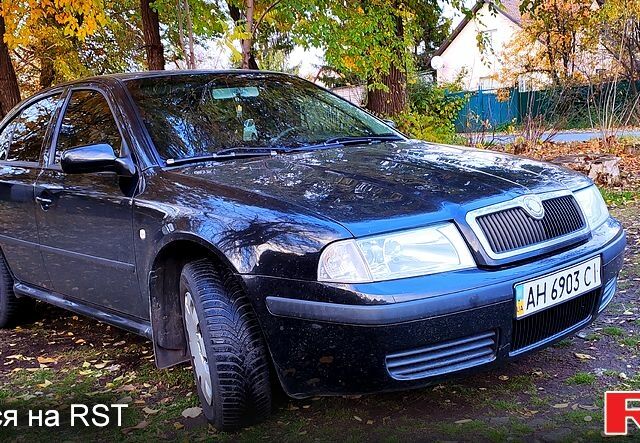Черный Шкода Октавия, объемом двигателя 1.6 л и пробегом 164 тыс. км за 5500 $, фото 5 на Automoto.ua