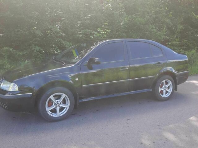 Чорний Шкода Октавія, об'ємом двигуна 1.6 л та пробігом 230 тис. км за 4400 $, фото 1 на Automoto.ua