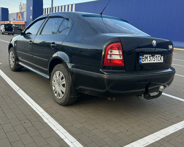 Черный Шкода Октавия, объемом двигателя 1.6 л и пробегом 263 тыс. км за 5600 $, фото 4 на Automoto.ua