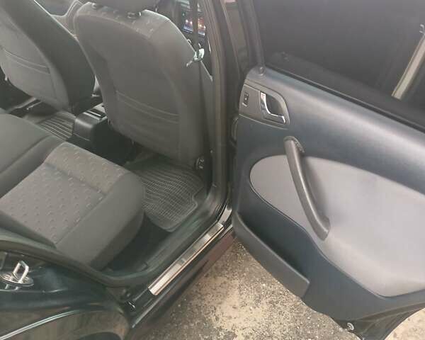 Черный Шкода Октавия, объемом двигателя 1.6 л и пробегом 212 тыс. км за 5600 $, фото 5 на Automoto.ua