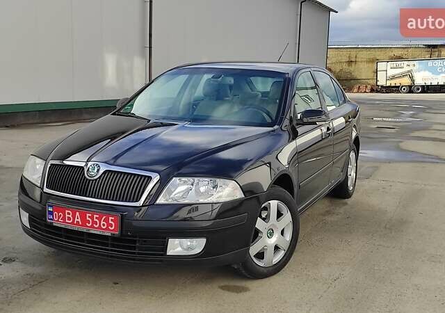 Черный Шкода Октавия, объемом двигателя 1.6 л и пробегом 218 тыс. км за 6999 $, фото 25 на Automoto.ua